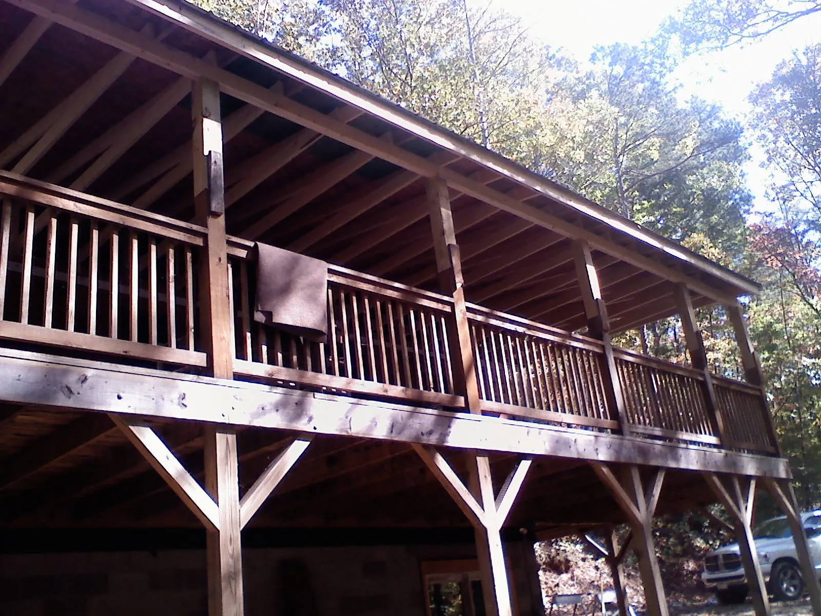Timber framing under a new elevated porch and deck — Roof Leak Repair in Oronoco by Roofing Brothers